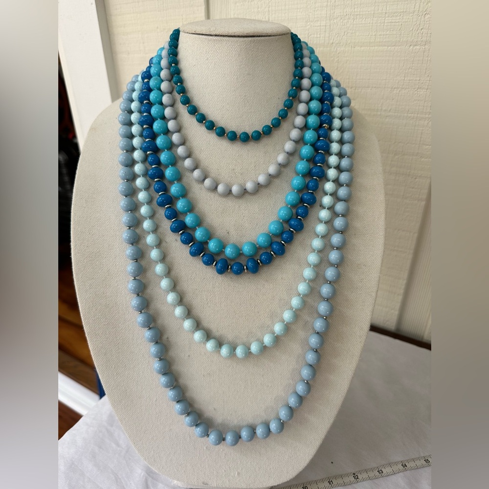 Set of six blue tone old lady style necklaces